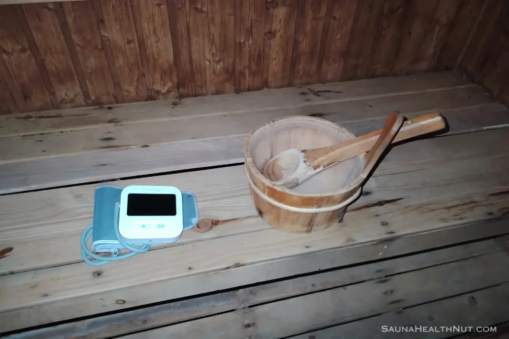 Taking a CONNEQT Pulse blood pressure reading before an traditional sauna session